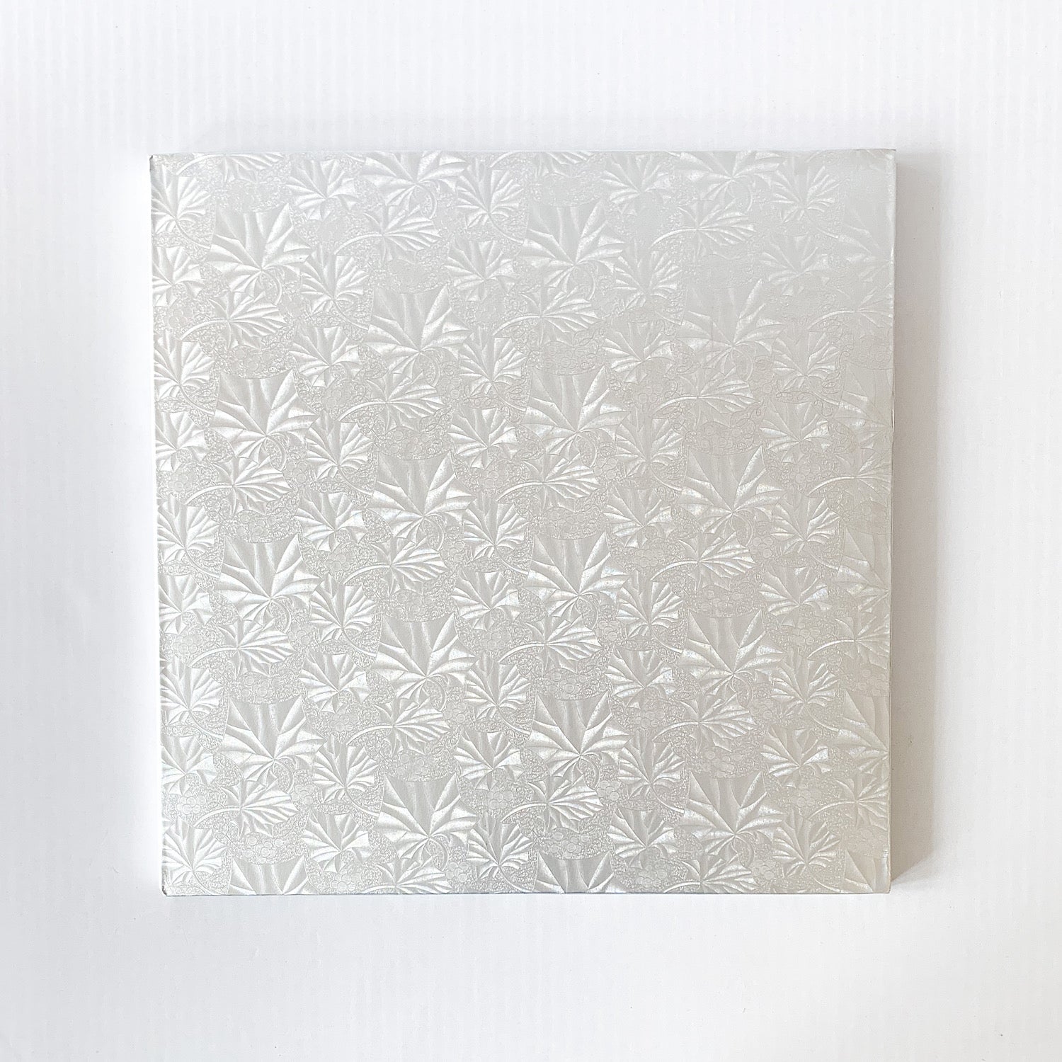 14" Square Silver Cake Board Embossed 1/4" - Papagino Foods Inc.