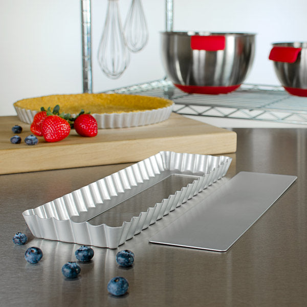 Fat Daddio, Oblong Fluted Tart Pan, Removable Bottom, 13 3/4 in x 4 1/4 in x 1 in (#PFT-1375) - Papagino Foods Inc.