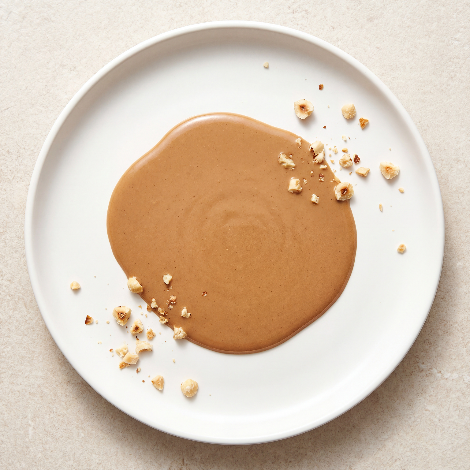 Barlo Hazelnut Gourmet Sauce by Papagino Foods Inc. in 800g jar, smooth hazelnut sauce with rich, nutty texture.